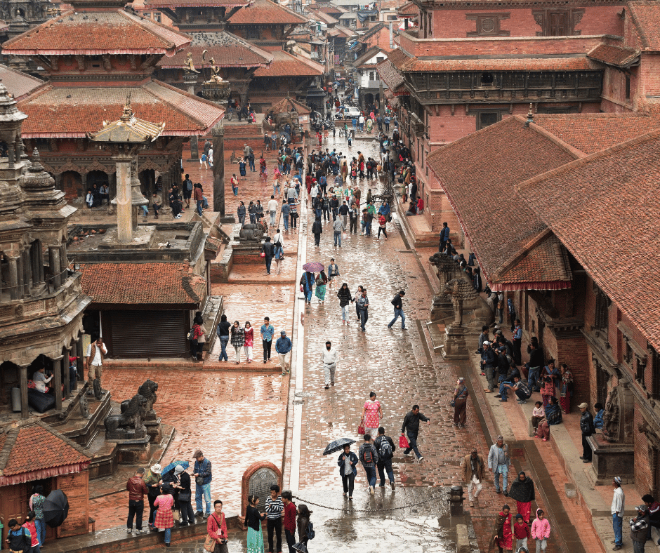 A bustling scene from Bhaktapur Durbar Square, featuring ancient Newari architecture, local markets, and cultural heritage in the heart of Nepal.