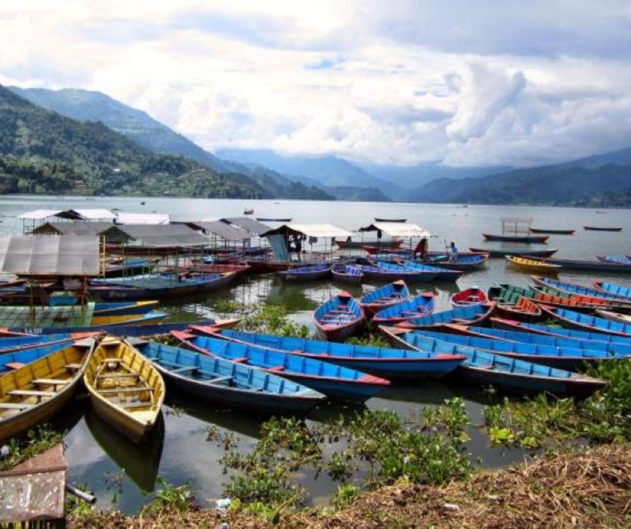 fishermen boats on the lake