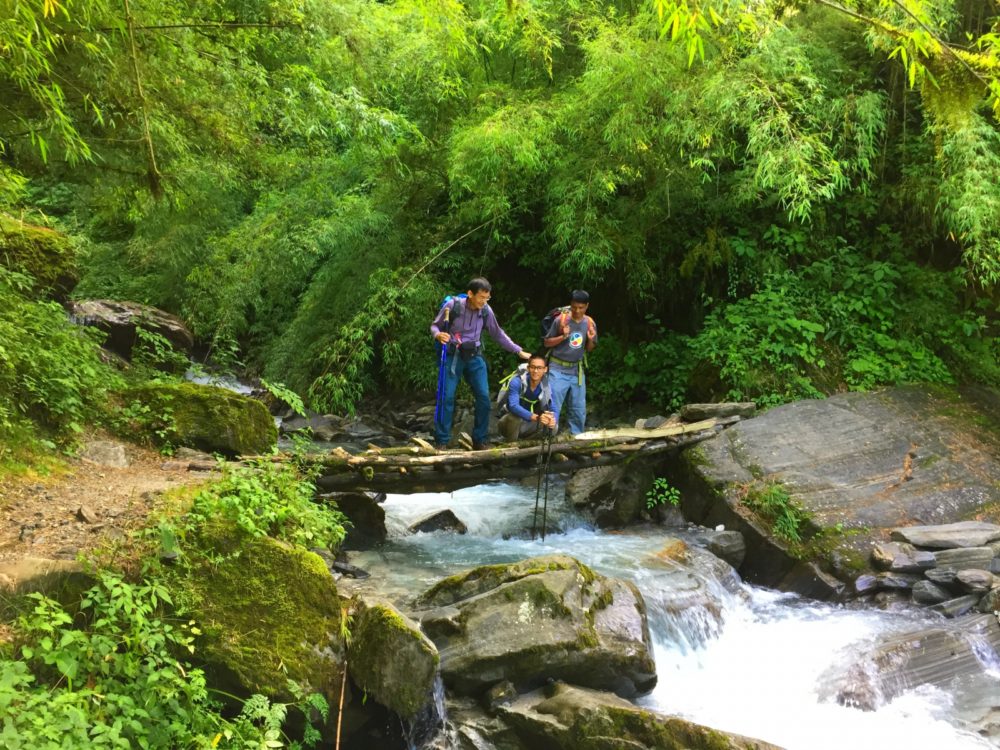 Wooden bridge over a river in Nepal