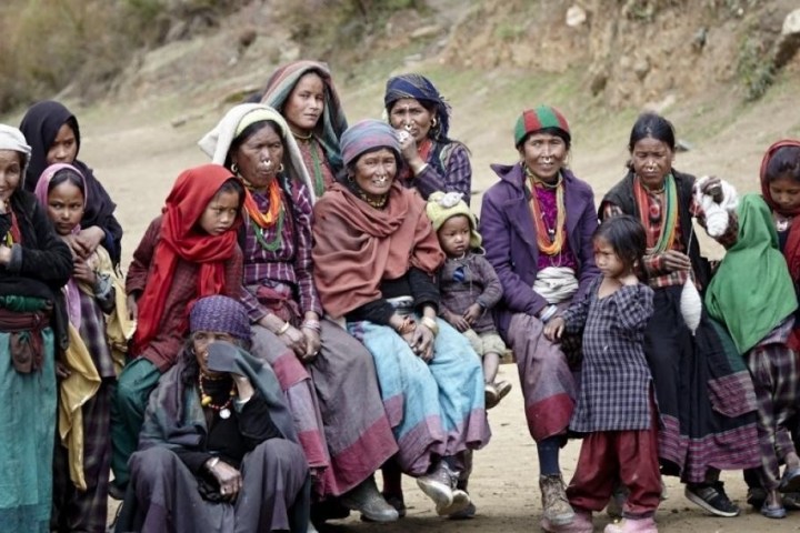 a group of people posing for the camera