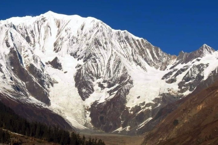 a view of a snow covered mountain